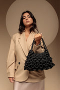 Black handwoven women’s handbag made from nautical rope