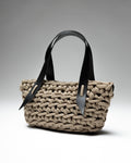 Handmade taupe nautical rope bag, crafted by hand in Portugal using lightweight rope, photographed in natural light.